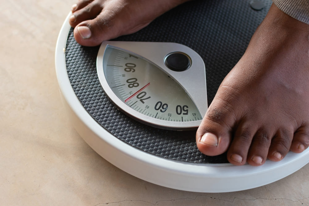 Person on weighing scale