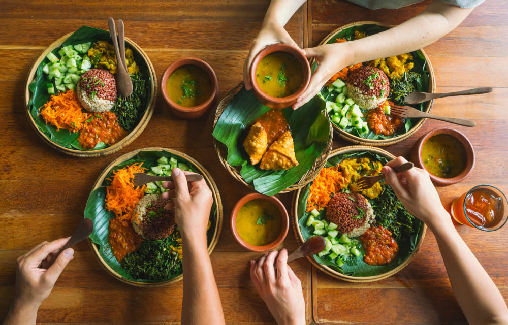 Most Indian homes have lots of vegetables with rice, rotis, and dhals.