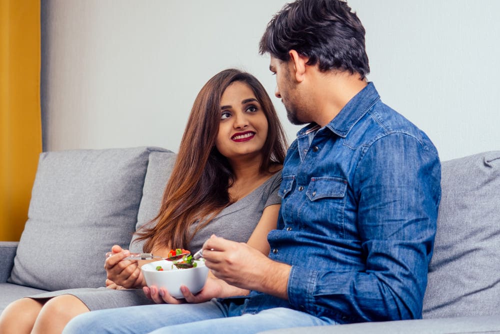 The reward hormones experienced from being loved and satisfying hunger are the same.